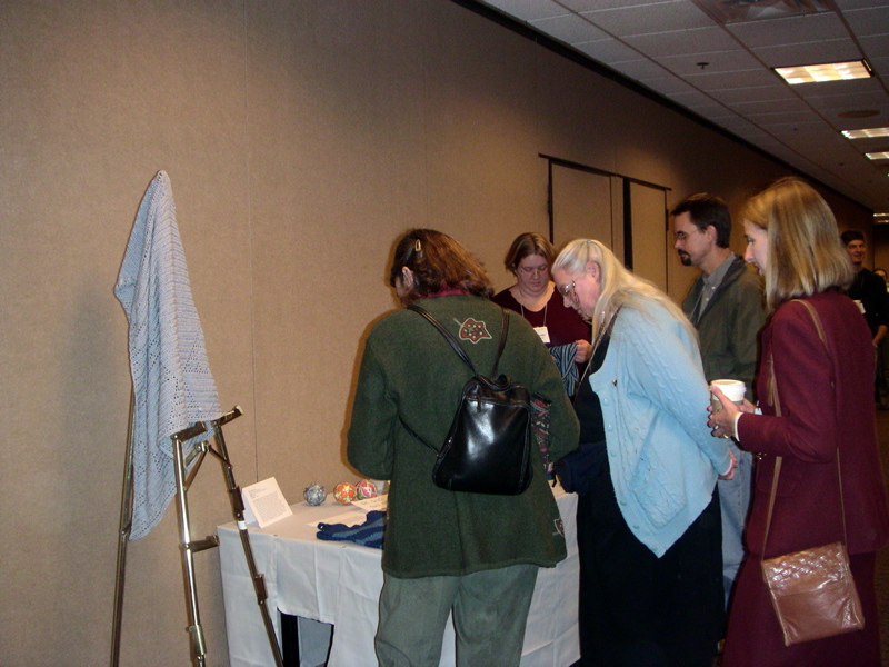 more folks I don't know at the Exhibit, except that I suspect it's Graham Leuschke in the background on the right.