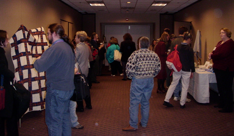 A wide view of the whole exhibit.  Is that Cathy Kessel with the red backpack?