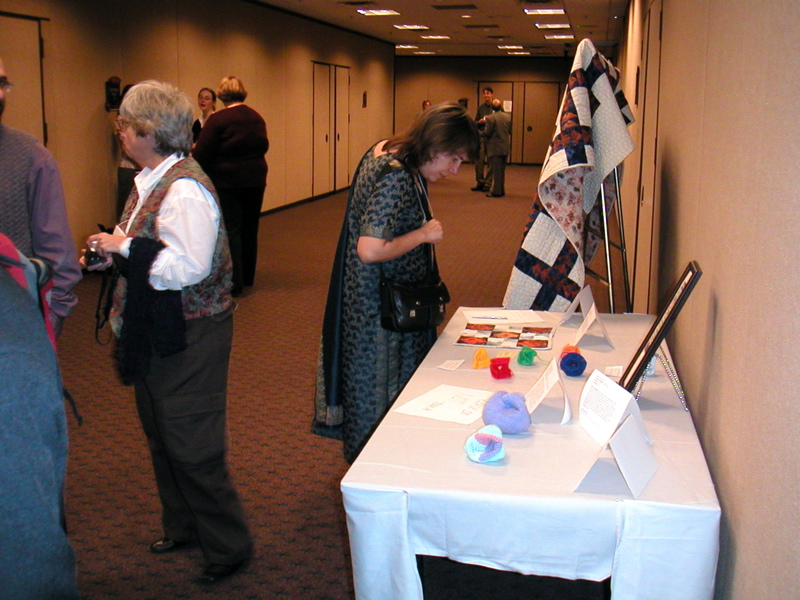 left to right in foreground: Josh Holden, wearing a vest used when he gave Lana's talk, Cathy Hayes, and Kim Plofker wearing a most excellent salwar/kameez/dupatta.