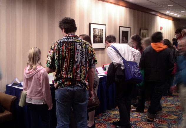 After sitting through a few talks, the young lady to the left was asked by the gentleman to her right whether she had had enough.  "No!" she replied.