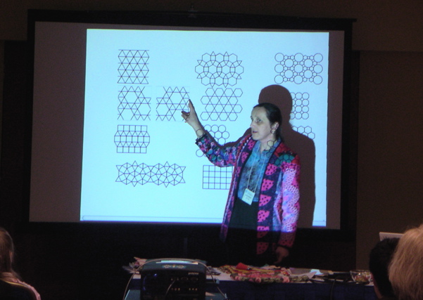 Irena shows semi-regular tessellations (and on the table before her are quilted examples of same)