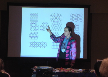 Irena shows semi-regular tessellations (and on the table before her are quilted examples of same)