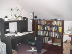 The bookshelf came with the house, and fits perfectly under the sloping ceiling